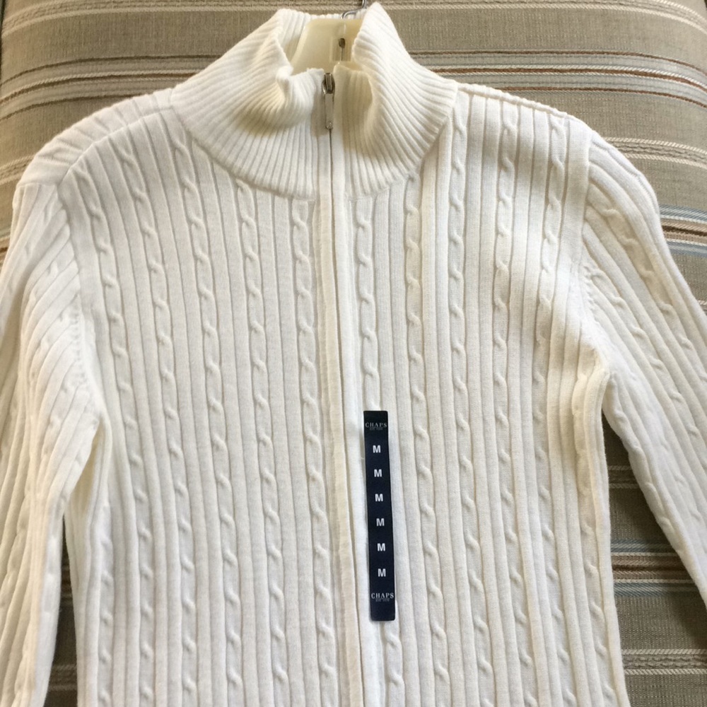 Full zip cable knit sweater.